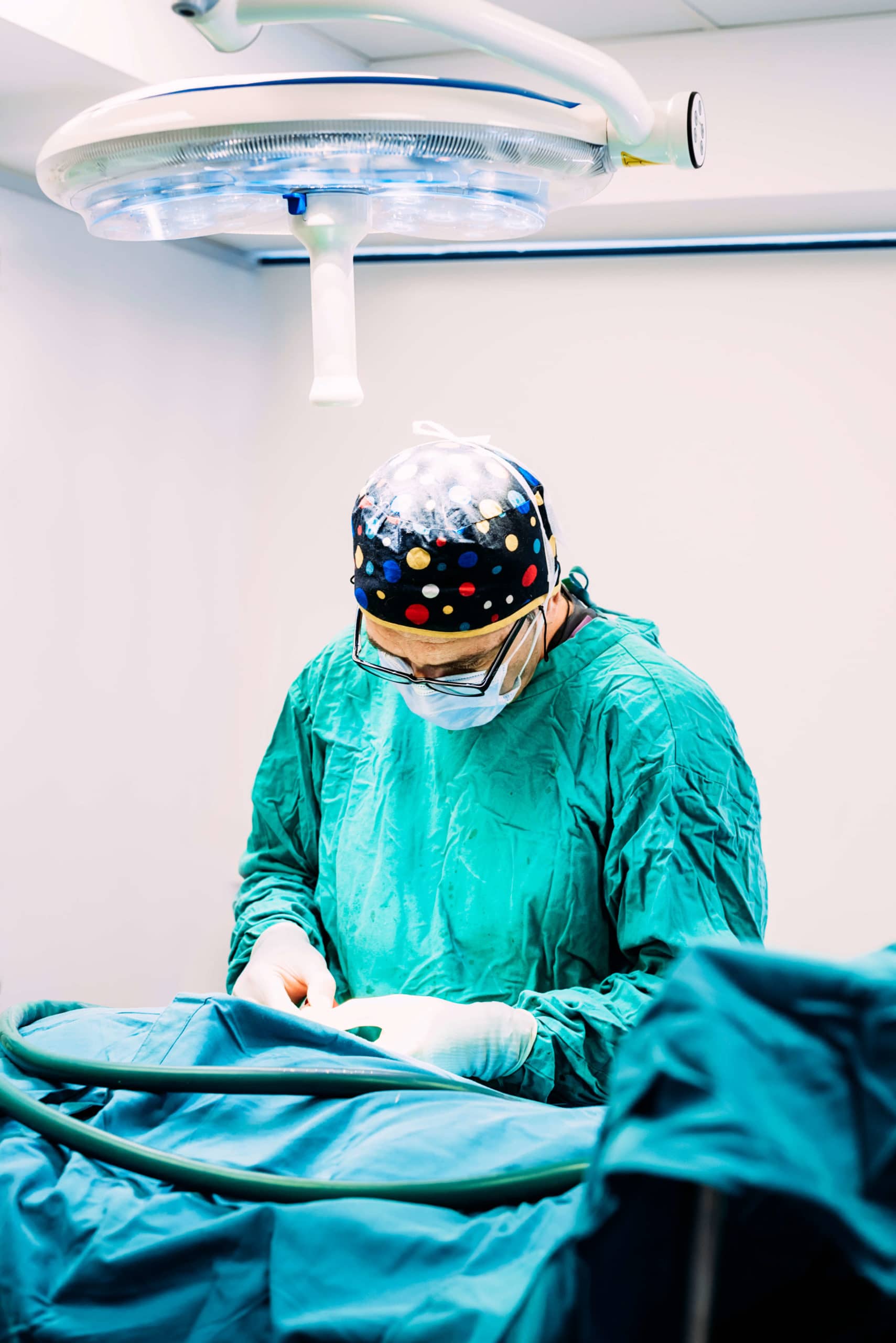 Surgeon Operating In A Hospital